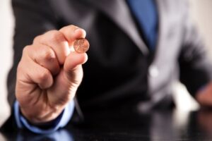 shiny penny in his hand