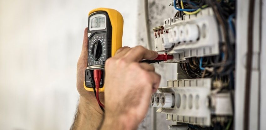 Detail shot of electrician testing voltage