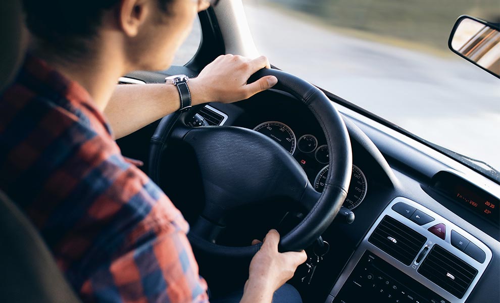 Teen driving car