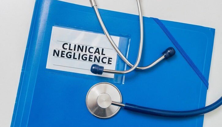 Blue folder with Clinical Negligence