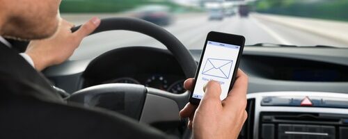 Driver Texting While Driving on Columbia road
