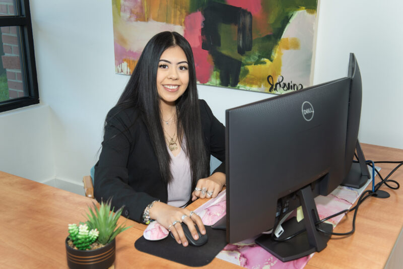 Stewart Law Offices employee at desk 