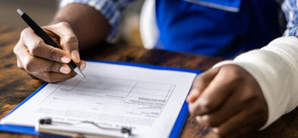 workers compensation victim filling out workers compensation claim