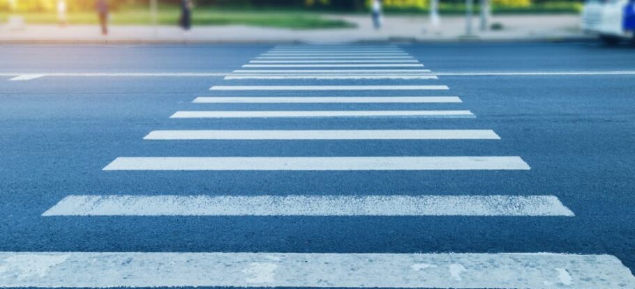 crosswalk with a car stopped