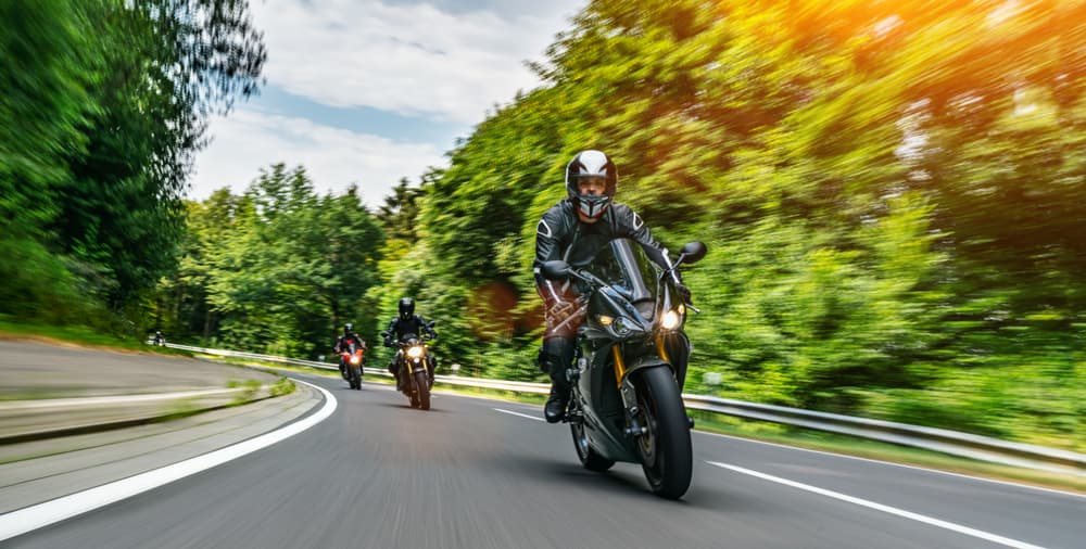 3 motorcycle riders riding in the blueridge parkway